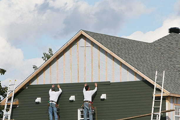 Professional Siding technician working in Louisville, KY
